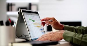 Project Management Software And Business Plan Schedule In Office