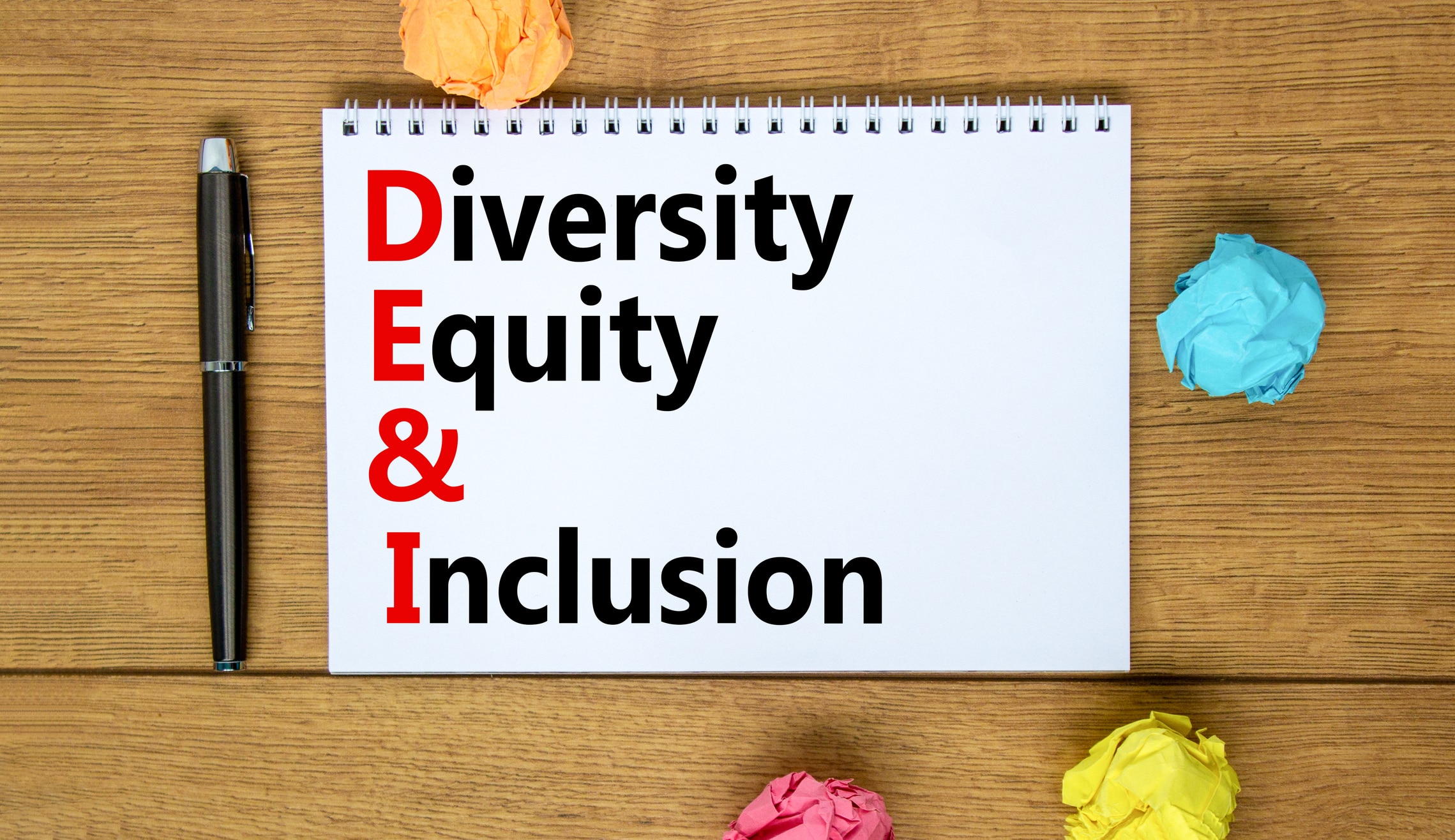 DEI, Diversity equity and inclusion symbol. Concept words DEI diversity equity and inclusion on the note on beautiful white background. Business DEI diversity equity and inclusion concept.