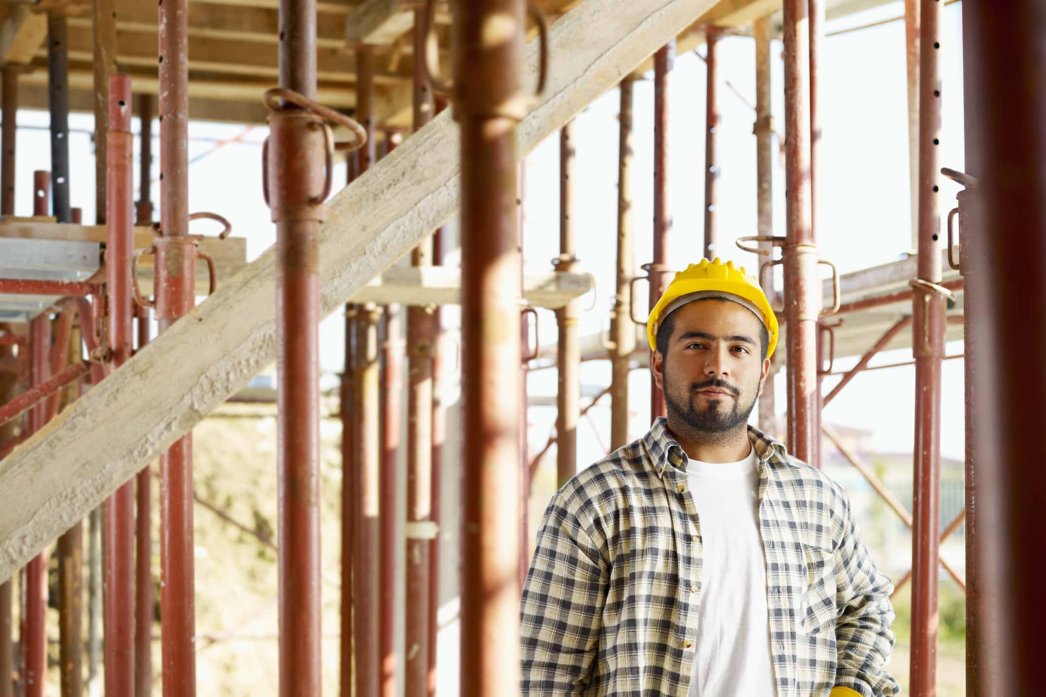Portrait of latin american construction worker looking at camera