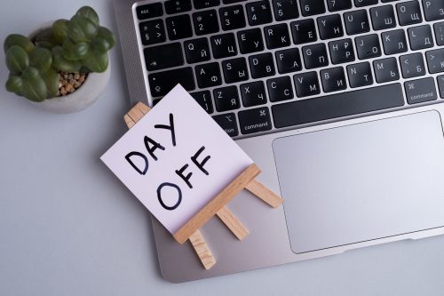 Day off - workplace message in the office. Concept of absence from work and day off